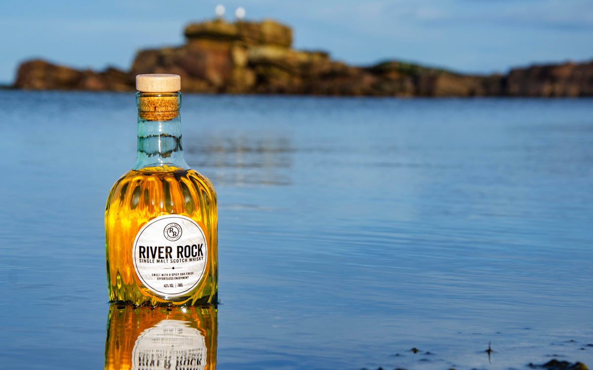 River Rock's distinctive glass bottle ready to be reused
